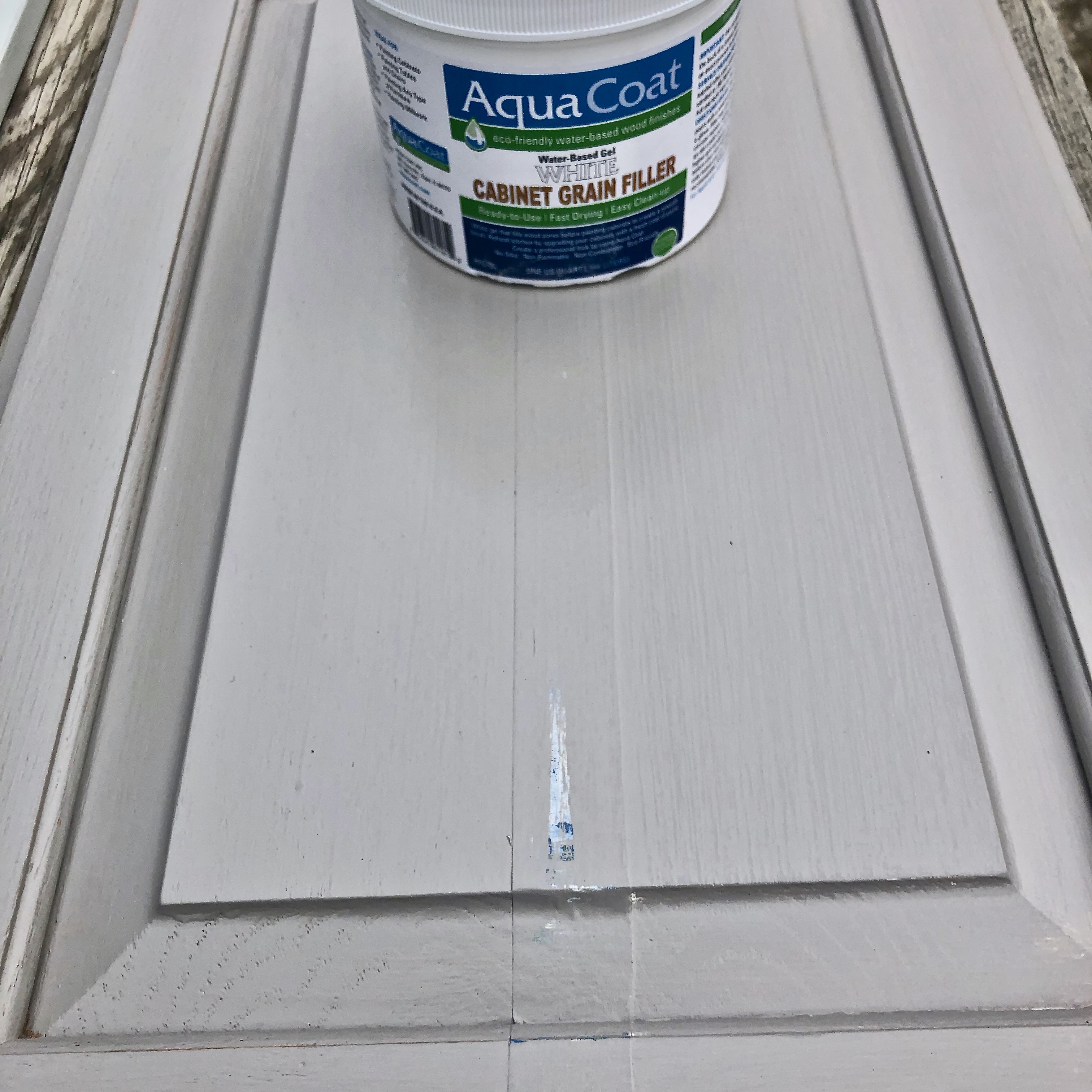 white cabinet grain filler